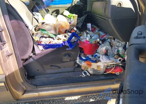 2000 Chevrolet Silverado 1500 Ls z USA, uszkodzony, nr VIN 2GCEK19T9Y1363464